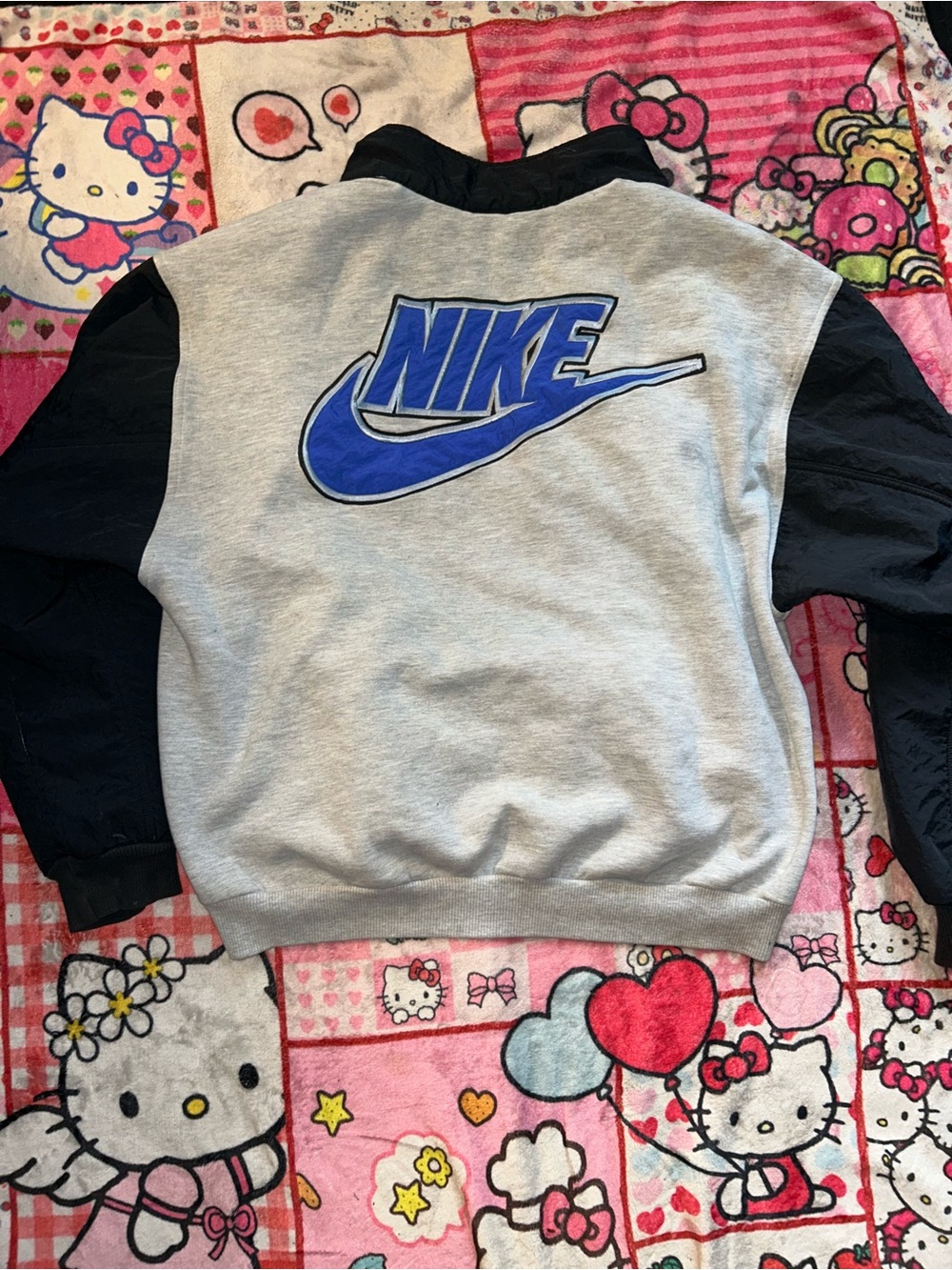 Nike Gray puffer jacket with Blue Logo and Black Sleeves